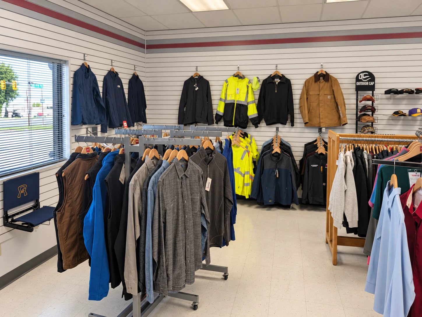 Edited photo of jackets and work shirt samples in the Del Print showroom